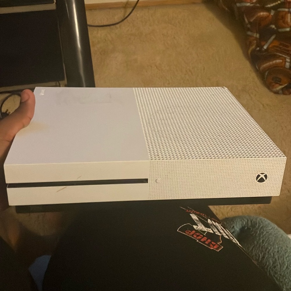 White Xbox One S with Power Cord & HDMI Cord included.